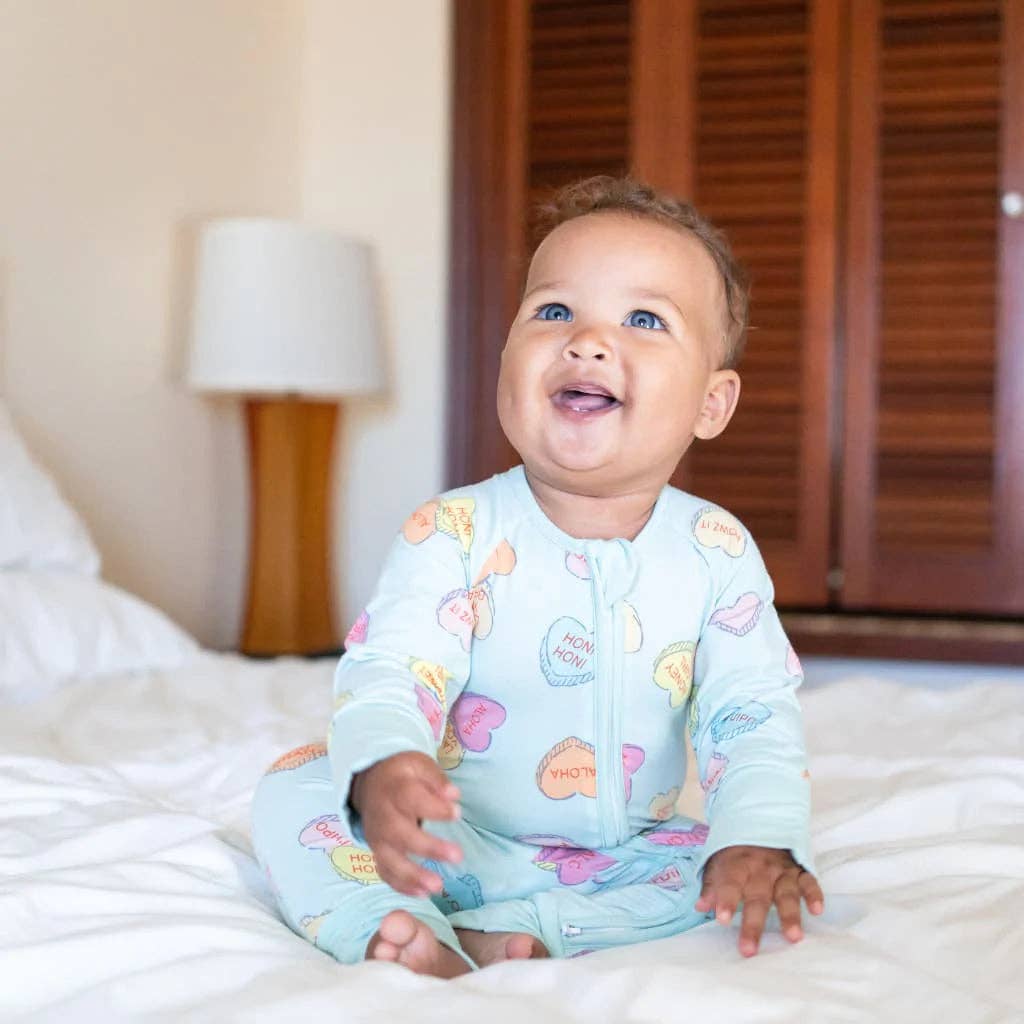 Baby wearing Coco Moon I Lava You Bamboo Coverall