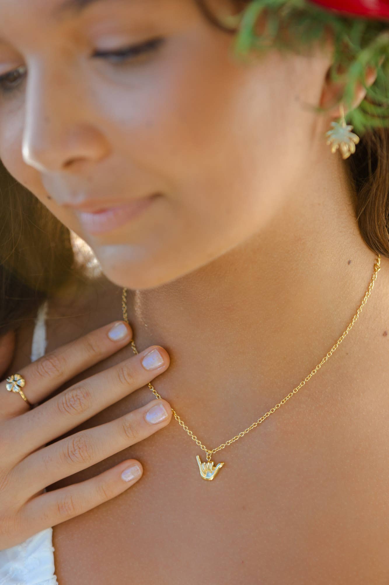 Person wearing Ki Ele Shaka Pendant Necklace