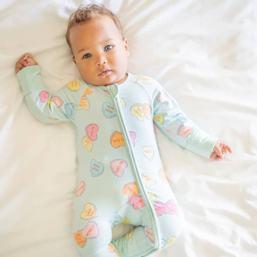 Baby wearing Coco Moon I Lava You Bamboo Coverall