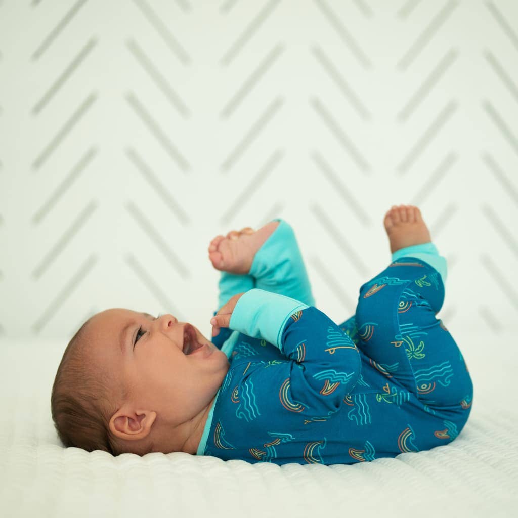 Baby wearing Coco Moon Tropical Daydream Bamboo Coverall