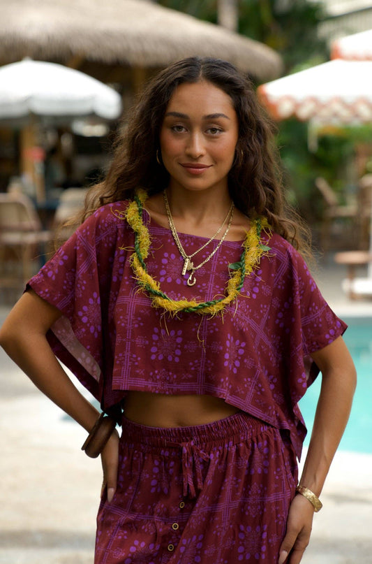 Person wearing EHA Culture Mango Sunset Hina Blouse