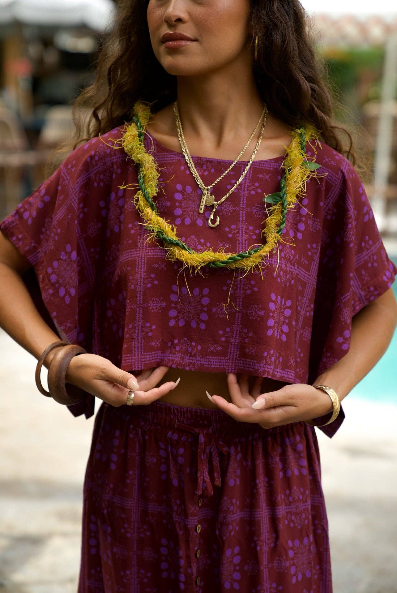 Person wearing EHA Culture Mango Sunset Hina Blouse