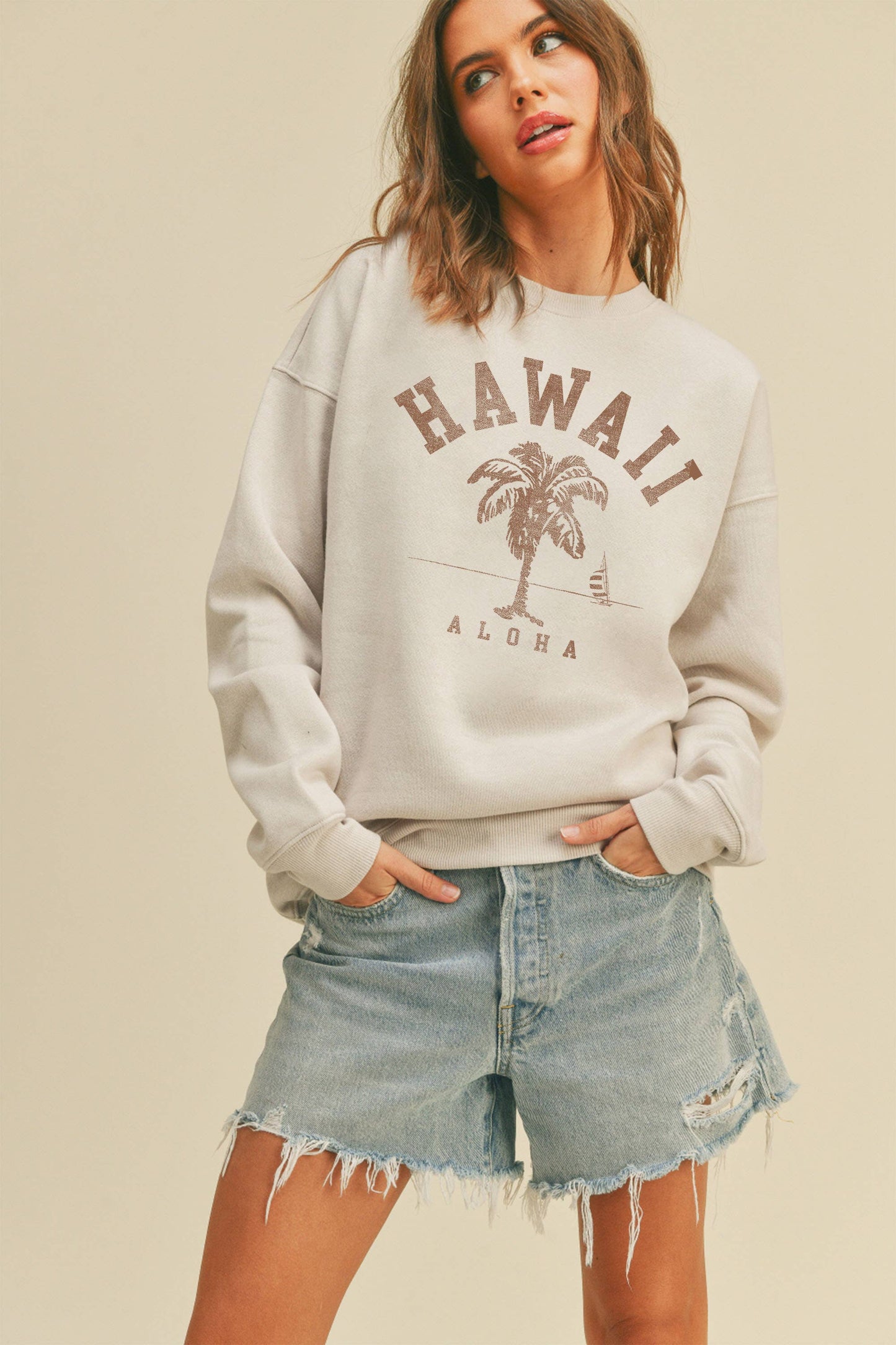 Person wearing Honestee Hawaii Aloha Palm Tree Graphic Sweatshirt (white)