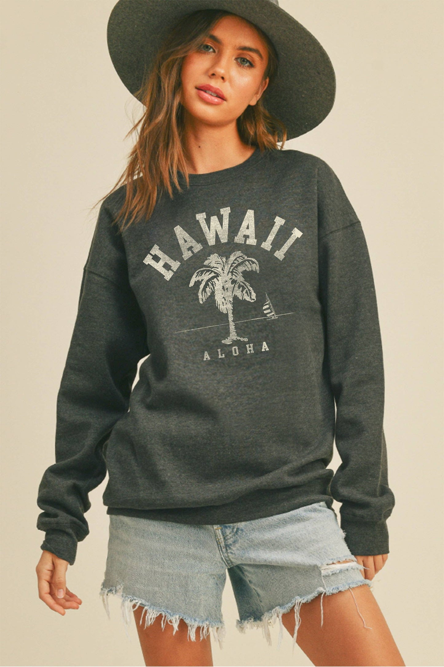 Person wearing Honestee Hawaii Aloha Palm Tree Graphic Sweatshirt (dark grey)