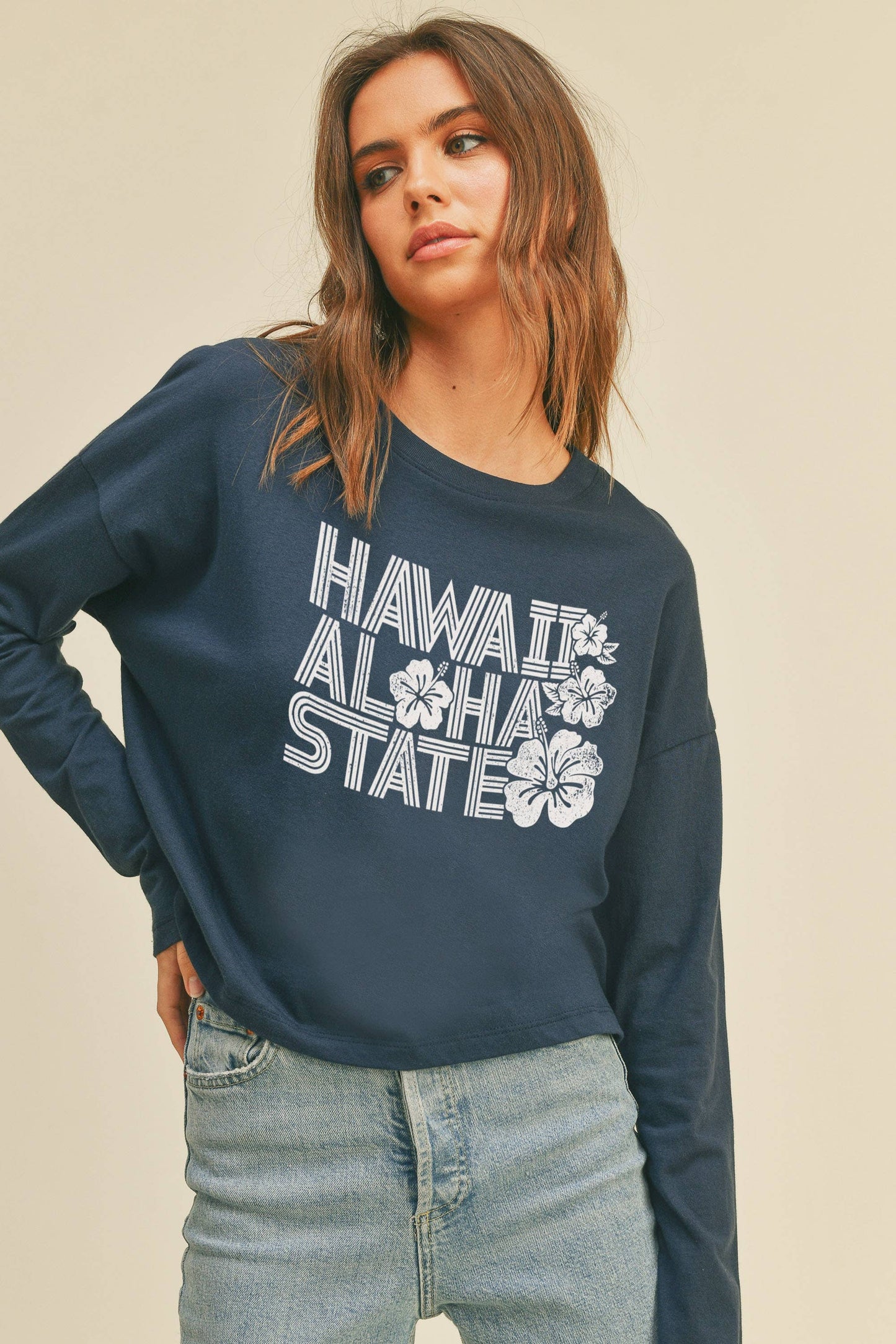 Person wearing Honestee Hawaii Aloha State Graphic T-Shirt (dark blue)