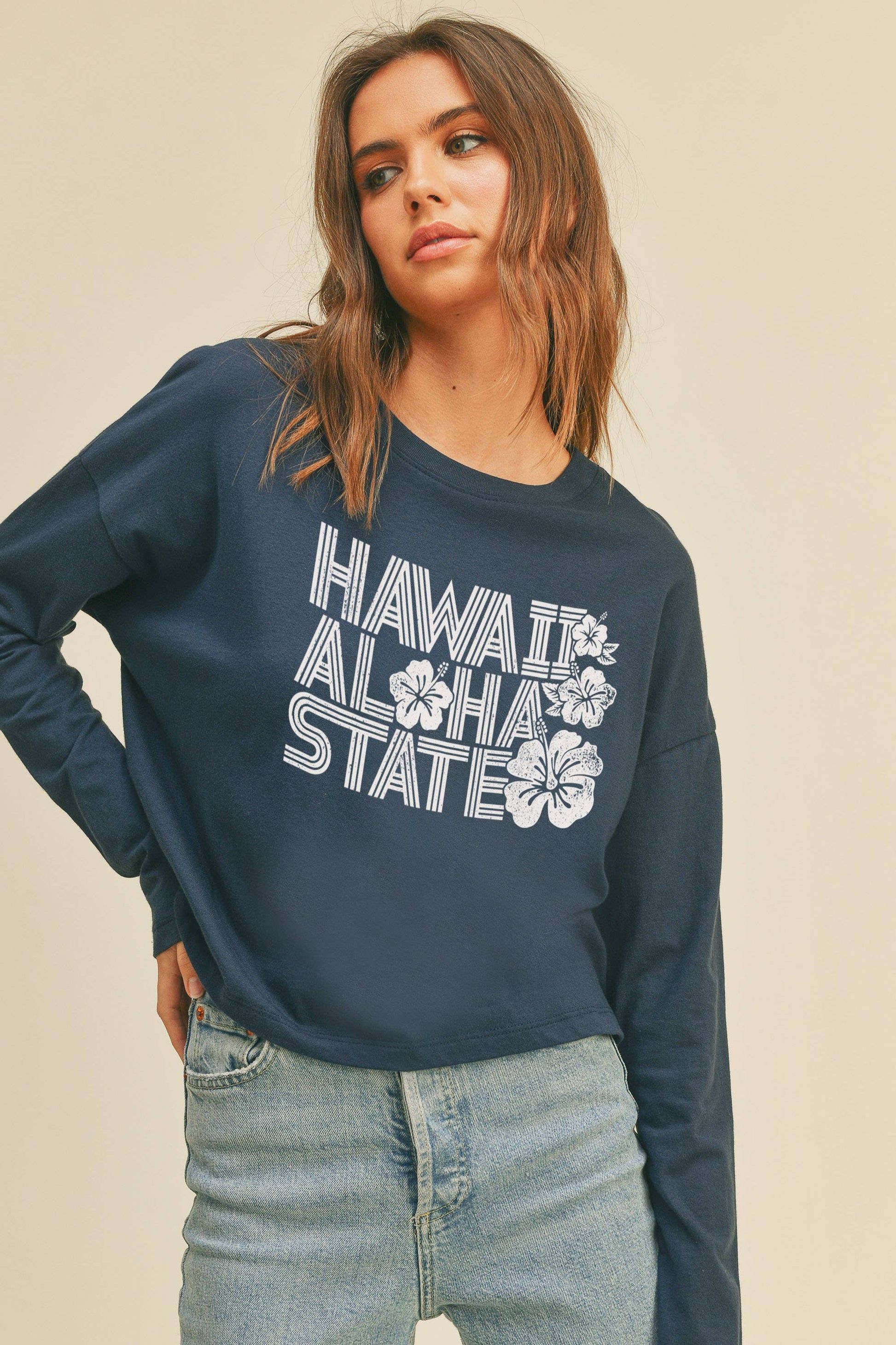 Person wearing Honestee Hawaii Aloha State Graphic T-Shirt (dark blue)