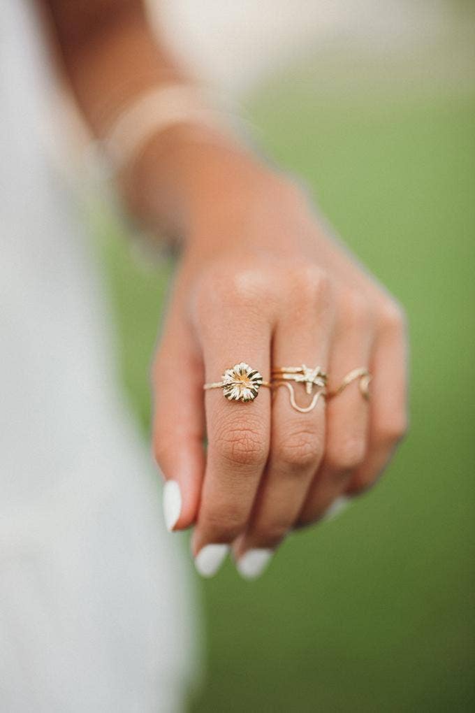 Person wearing Ki Ele Aloha Hibiscus Ring