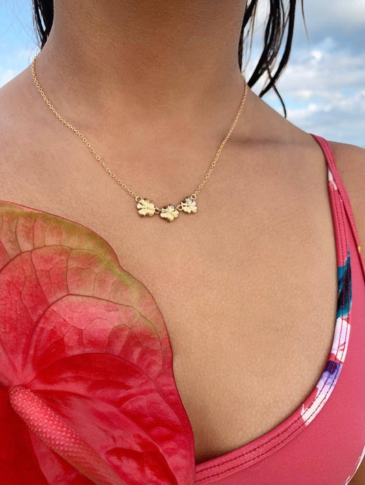 Person wearing Melia Trio Flower Connector Necklace