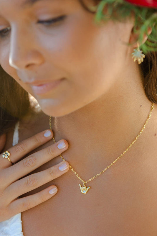 Person wearing Ki Ele Shaka Pendant Necklace