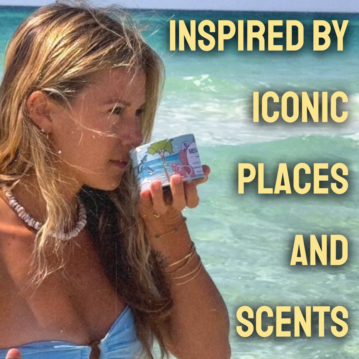 Person sniffing Postcards Hawaii candle, "INSPIRED BY ICONIC PLACES AND SCENTS"