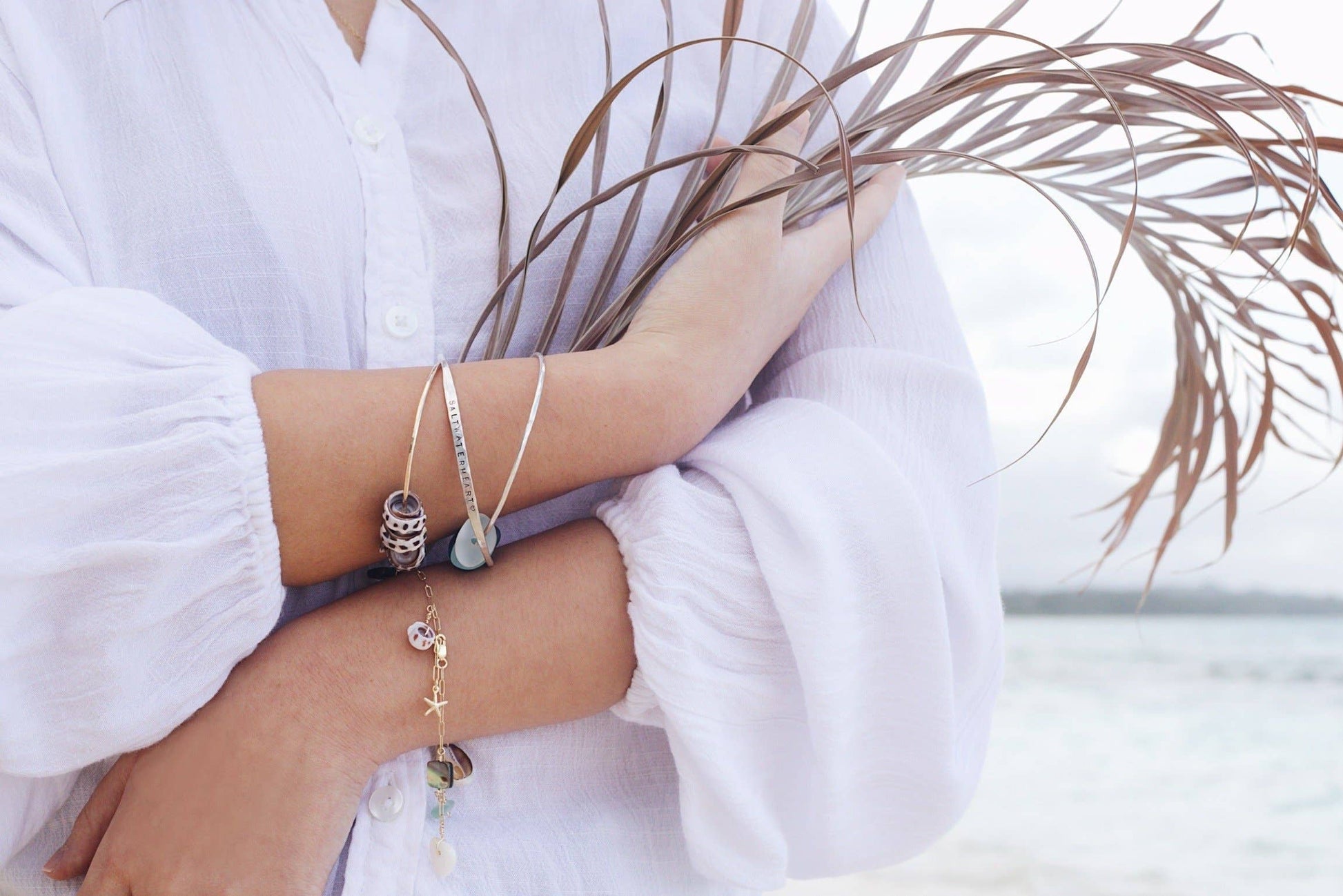 Wearing Salty But Sweet Gold Ocean Charm Bracelet