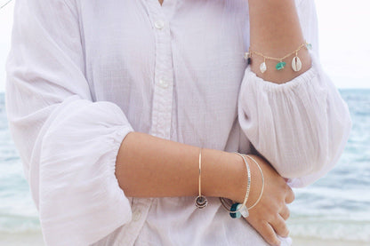 Wearing Salty But Sweet Gold Ocean Charm Bracelet