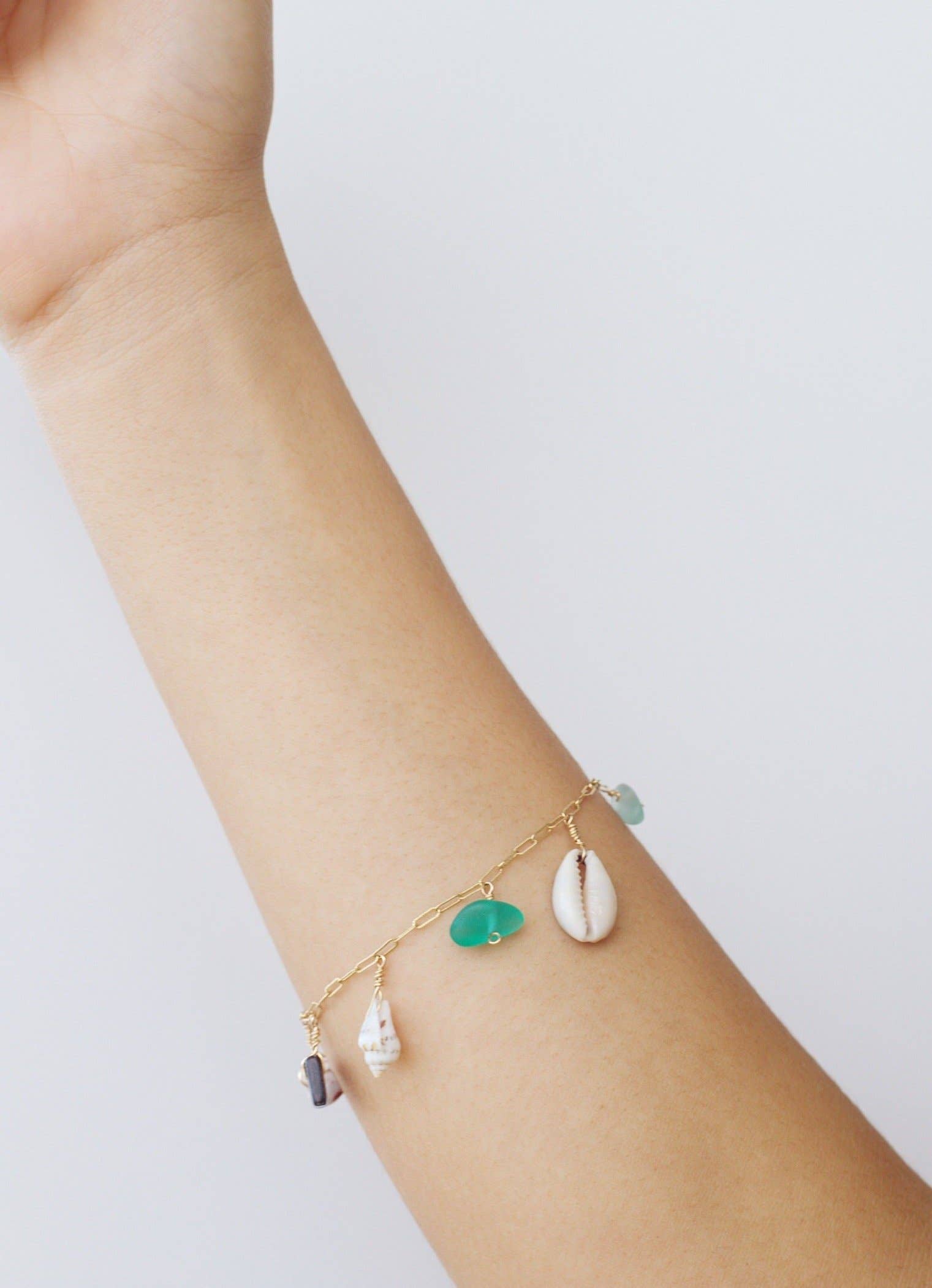 Wearing Salty But Sweet Gold Ocean Charm Bracelet
