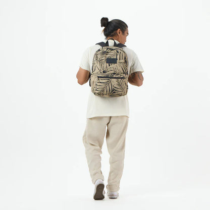 Person wearing Aloha Collection Areca Frappe/Black Keep it Light Backpack