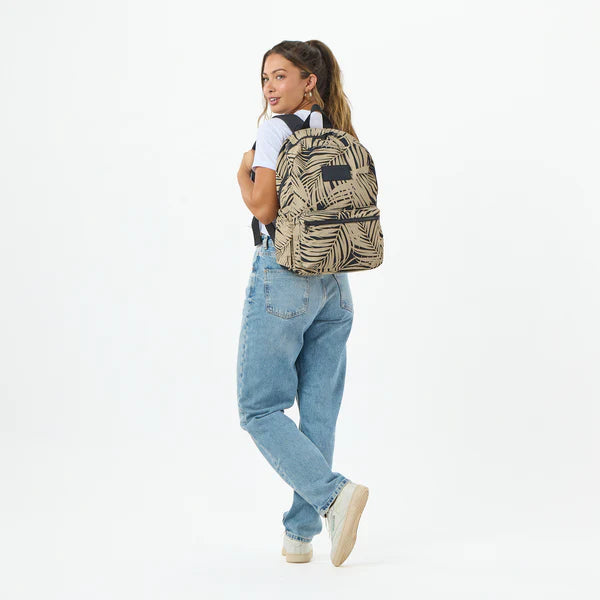 Person wearing Aloha Collection Areca Frappe/Black Keep it Light Backpack