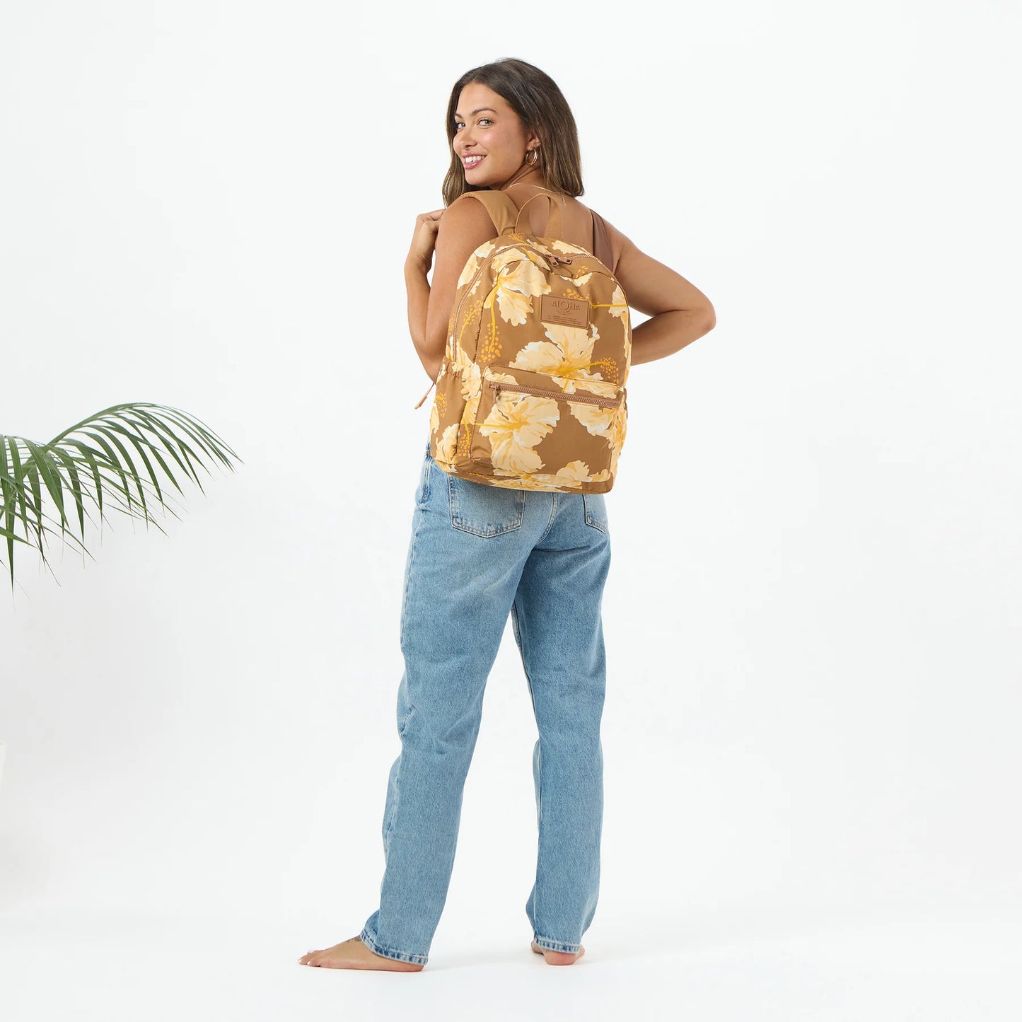 Person wearing Aloha Collection Taha'a Toffee Keep it Light Backpack